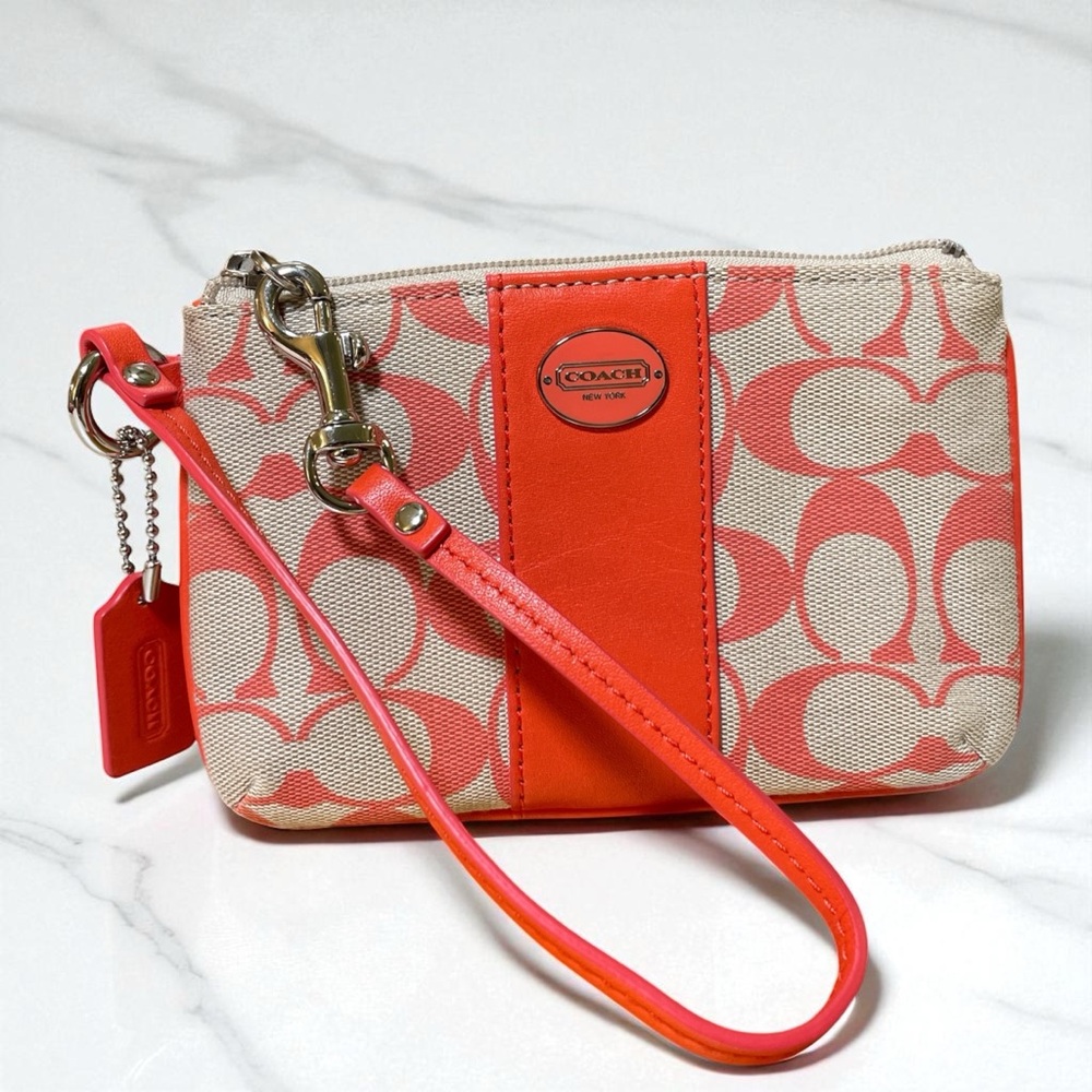 COACH - Orange and Cream signature C Wristlet EUC